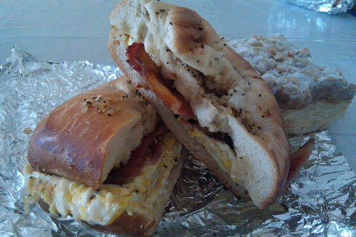 2 eggs and bacon on a bialy